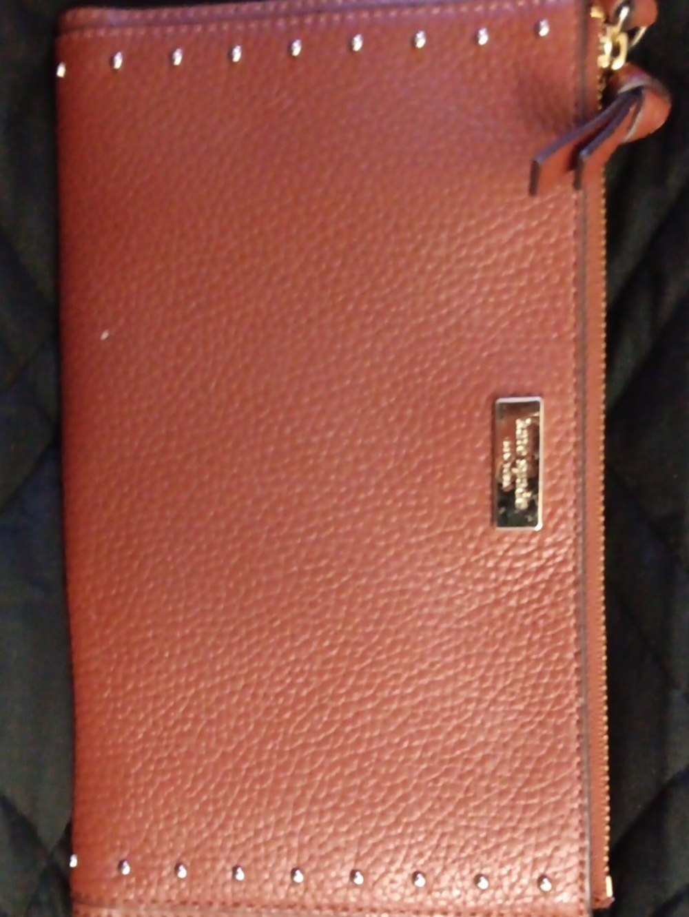 kate spade pebbled leather wristlet clutch in rust brown with gold studs